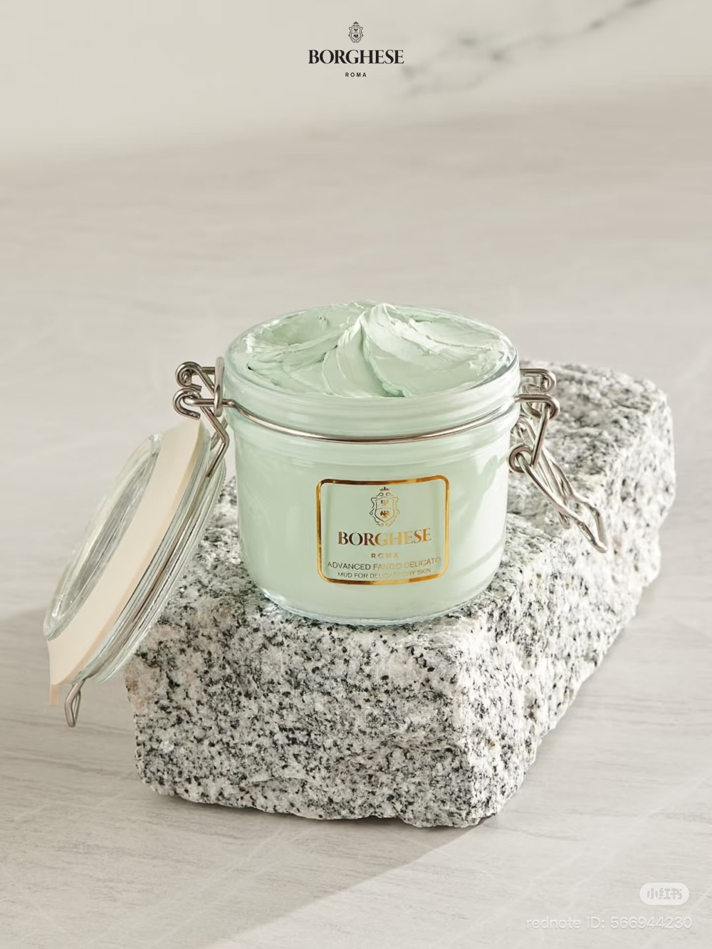 Borghese Advanced Fango Delicato mud mask jar resting on a stone block